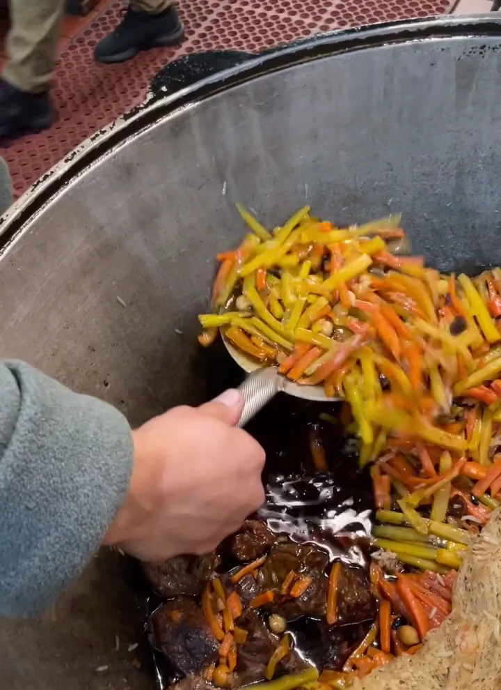 Plov being prepared at Oasis